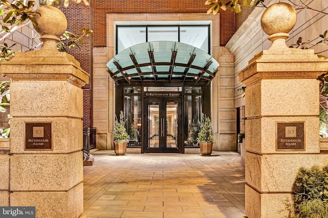 entrance to property featuring french doors