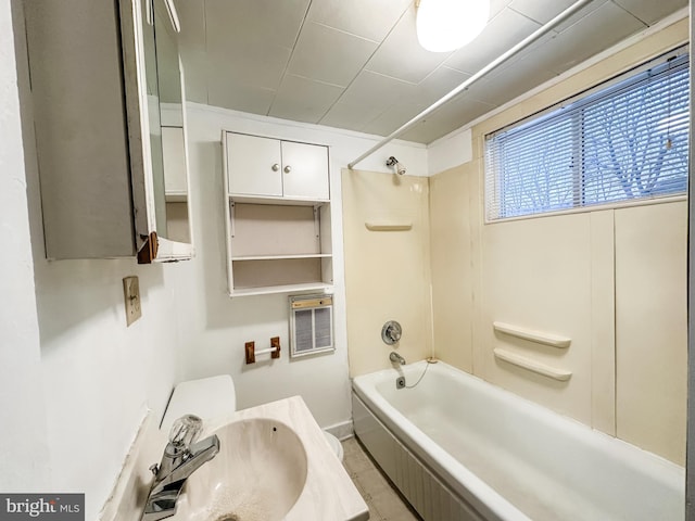 bathroom featuring shower / bath combination and sink