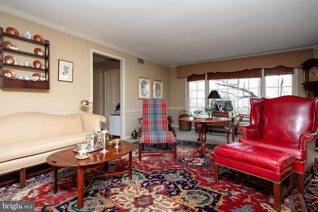 living room featuring crown molding