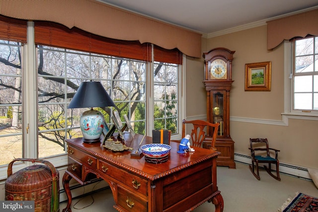 office featuring crown molding, light colored carpet, and a baseboard heating unit