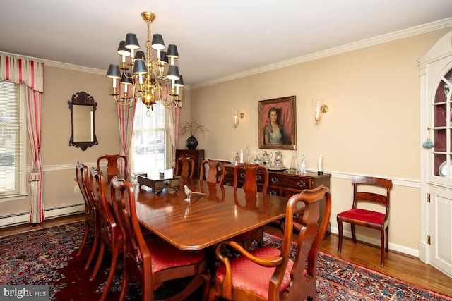 dining room featuring a notable chandelier, wood-type flooring, ornamental molding, and baseboard heating