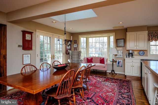 dining area featuring french doors and dark hardwood / wood-style floors