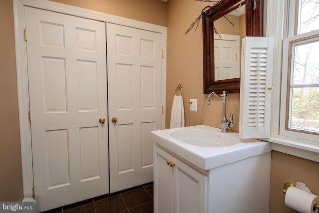 bathroom with vanity and tile patterned flooring