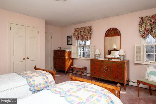 bedroom featuring multiple windows, a closet, and carpet