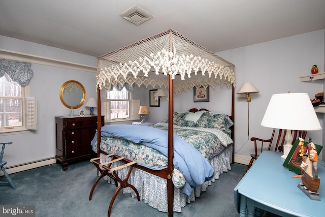 carpeted bedroom featuring a baseboard heating unit and a chandelier