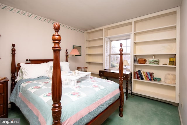 carpeted bedroom featuring a baseboard radiator