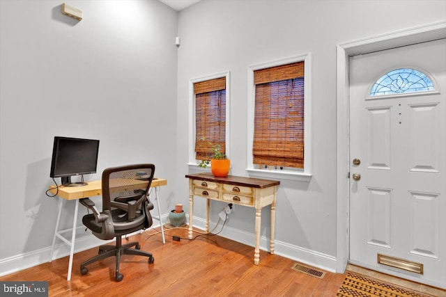 home office featuring light hardwood / wood-style floors