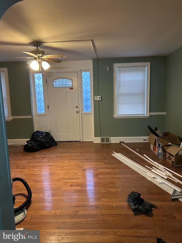 entryway featuring hardwood / wood-style flooring and ceiling fan