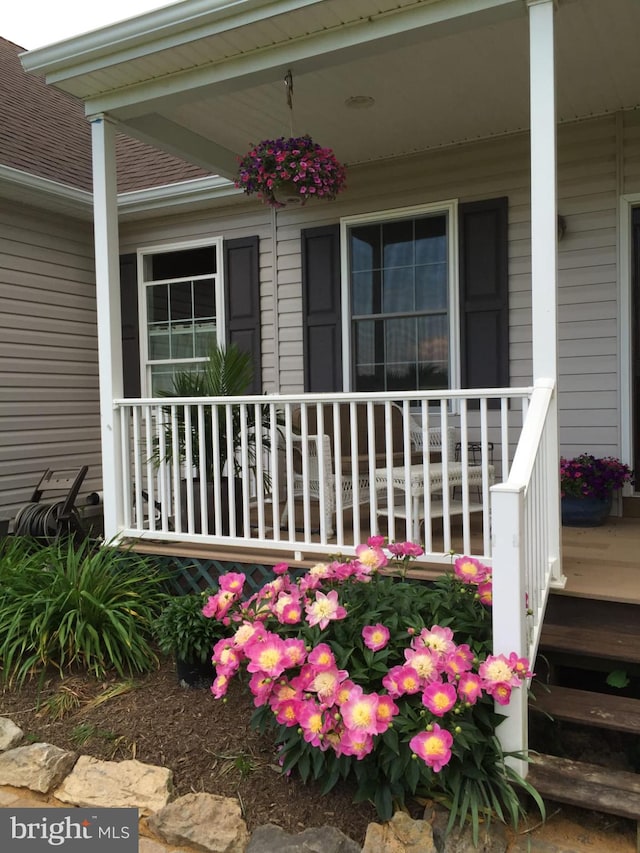 doorway to property with a porch