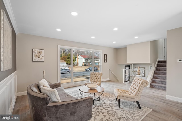 living room with light hardwood / wood-style flooring