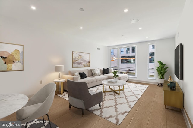 living room with light hardwood / wood-style floors