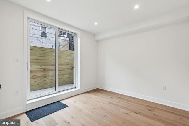 empty room featuring light hardwood / wood-style floors