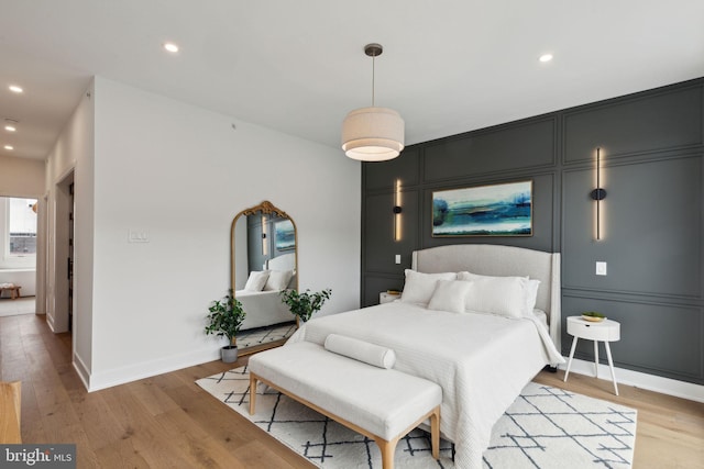 bedroom featuring light hardwood / wood-style flooring