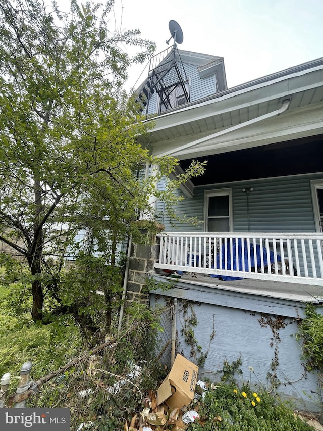 view of home's exterior featuring a balcony