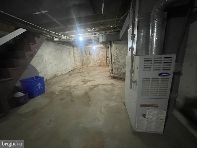 basement featuring heating unit