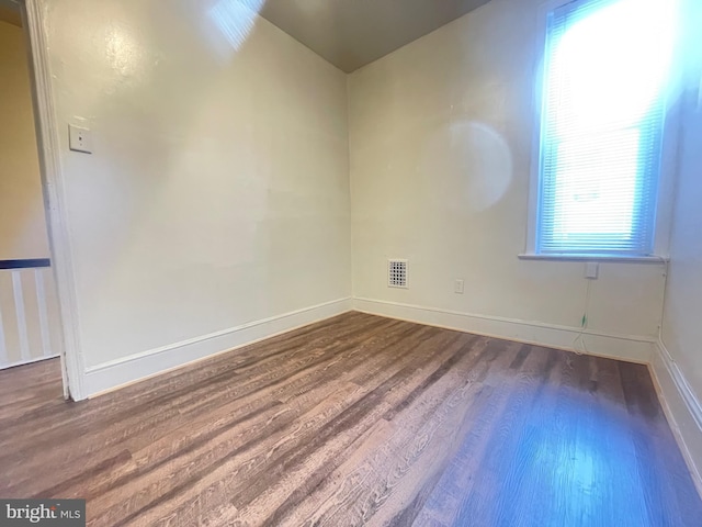 empty room featuring hardwood / wood-style floors