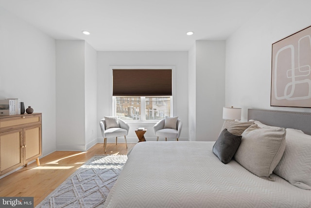 bedroom featuring light hardwood / wood-style floors