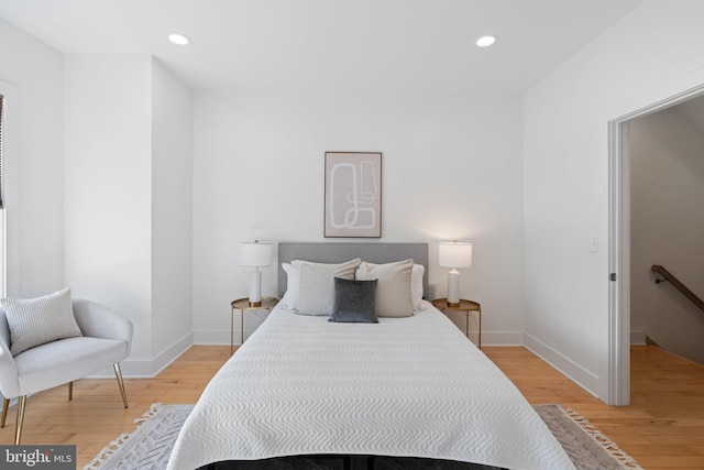 bedroom featuring wood-type flooring