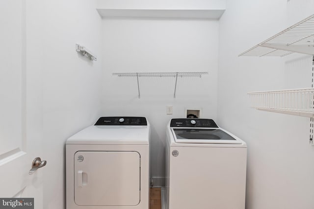 laundry area featuring separate washer and dryer