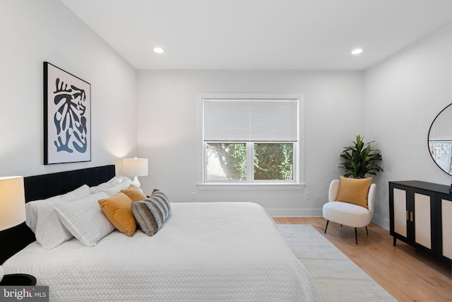 bedroom featuring light hardwood / wood-style floors