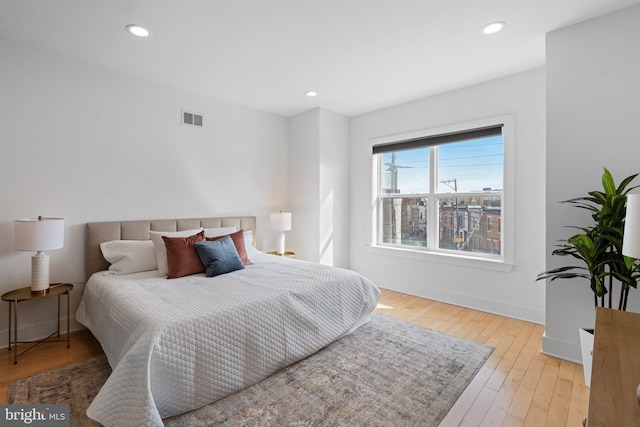 bedroom featuring hardwood / wood-style floors