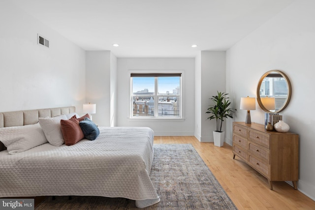 bedroom featuring light hardwood / wood-style floors