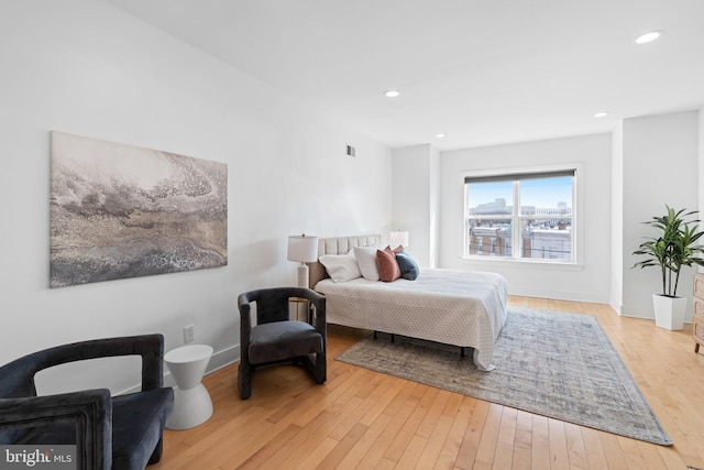 bedroom with light wood-type flooring