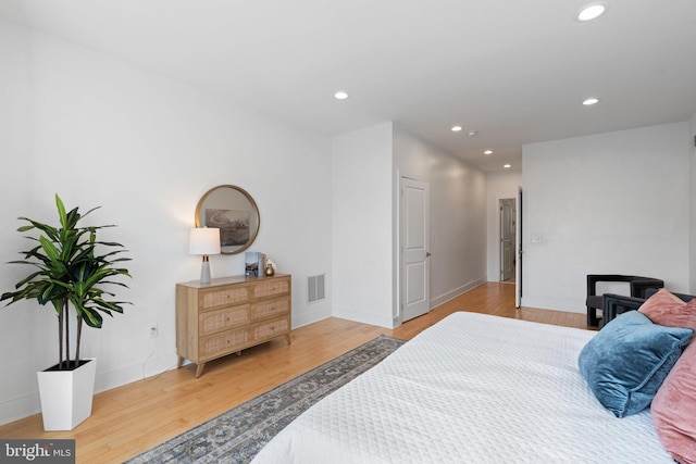 bedroom featuring light wood-type flooring