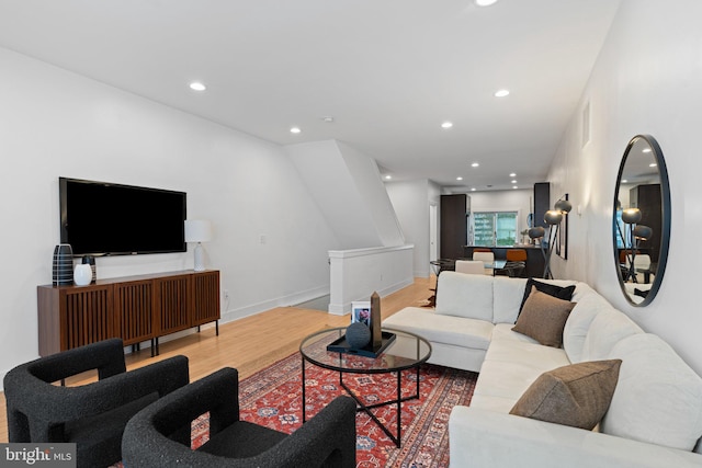 living room with light hardwood / wood-style floors