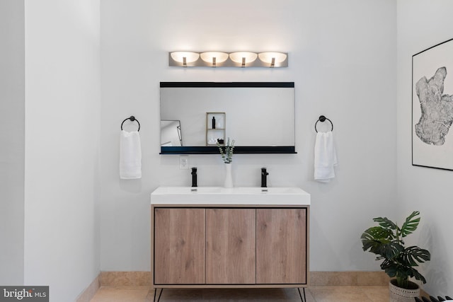 bathroom with vanity and tile patterned flooring