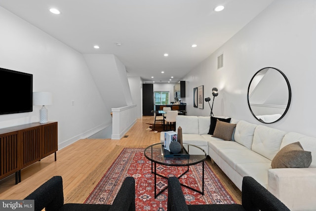 living room featuring light wood-type flooring