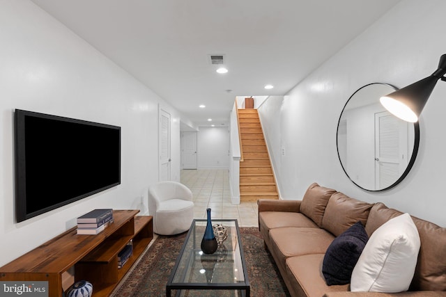 living room featuring light tile patterned flooring