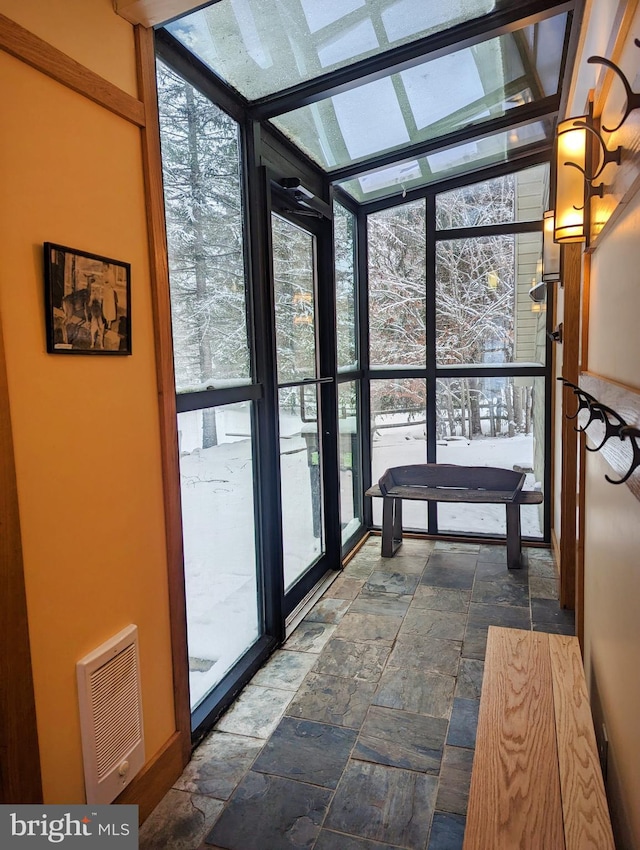 sunroom with plenty of natural light