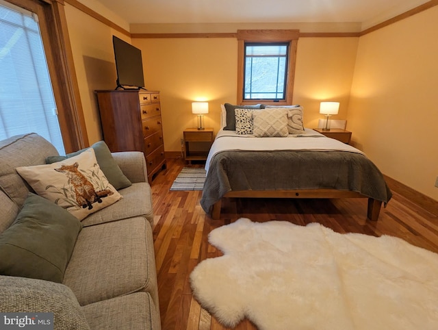 bedroom featuring wood-type flooring