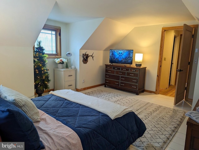 bedroom with vaulted ceiling