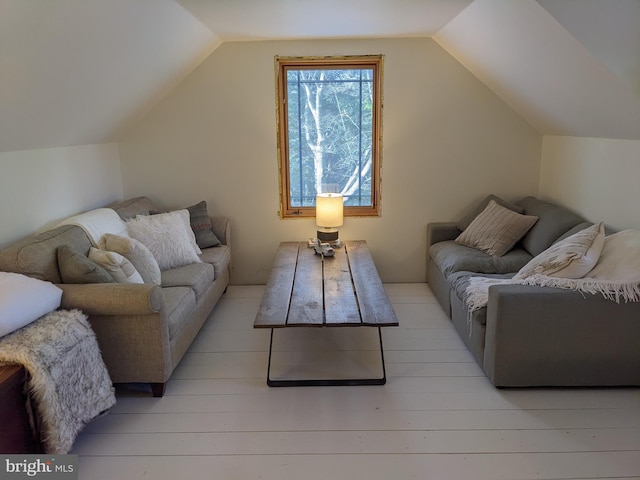 living room with lofted ceiling