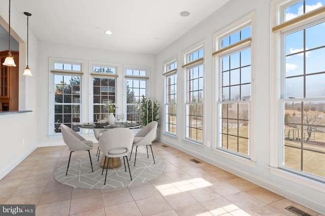 sunroom / solarium with visible vents