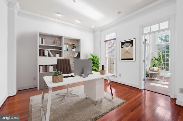 office featuring recessed lighting, crown molding, baseboards, and wood finished floors