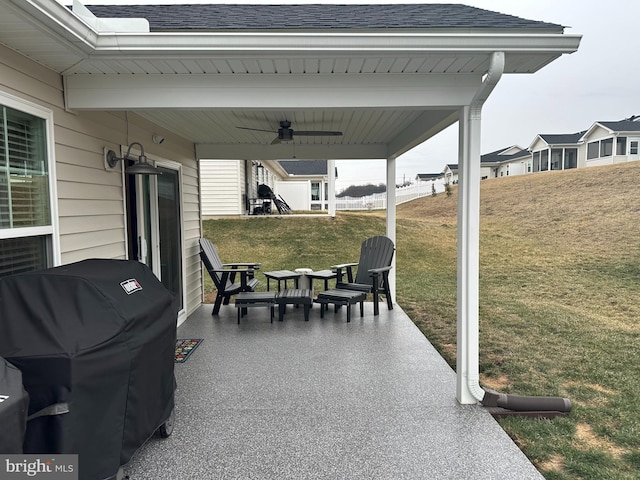 view of patio / terrace with area for grilling and ceiling fan