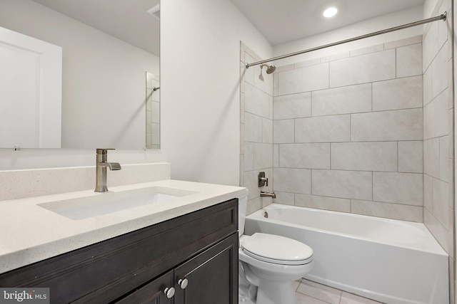 bathroom with toilet, vanity, shower / bath combination, and tile patterned flooring