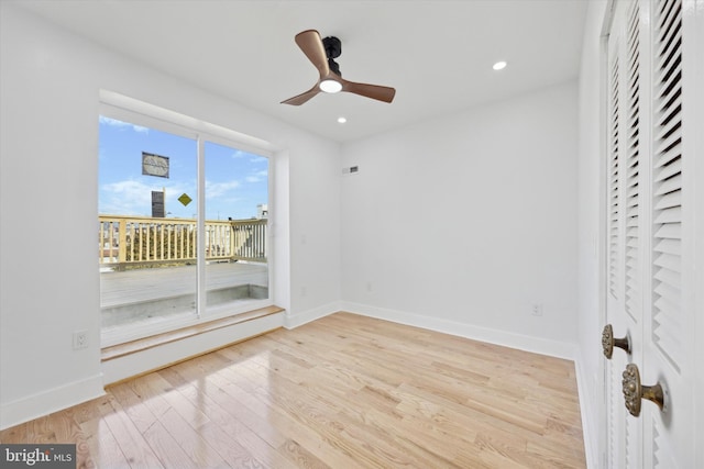 interior space with ceiling fan and light hardwood / wood-style flooring