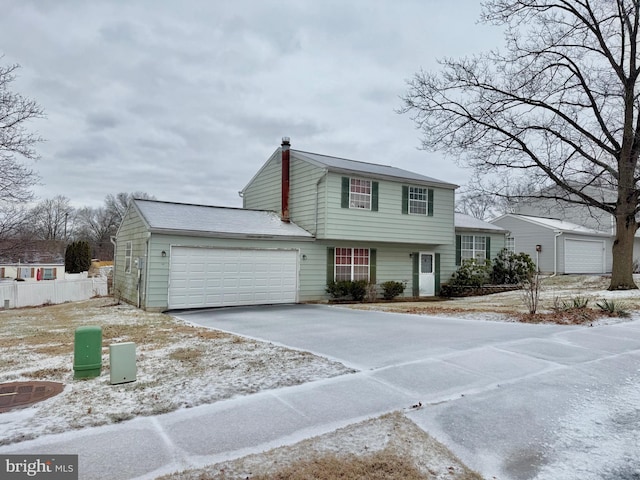 view of front of home with a garage