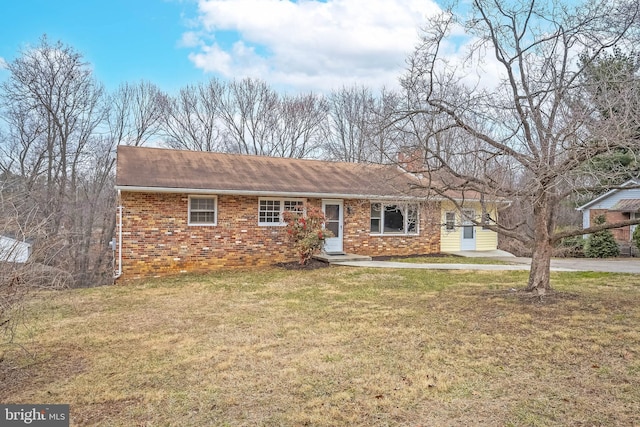 single story home with a front yard