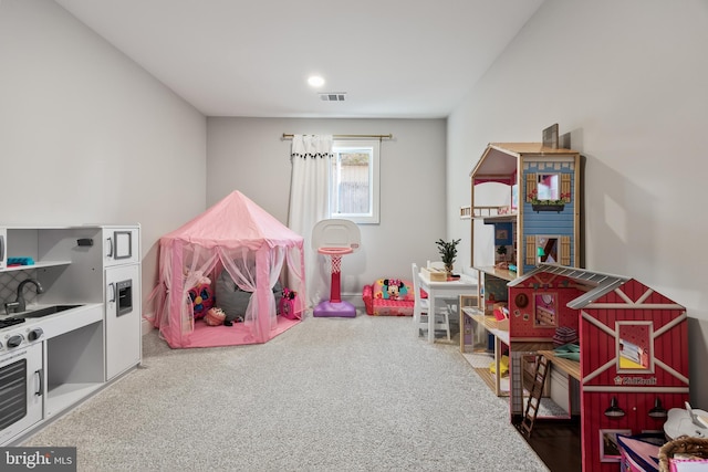 game room with carpet floors