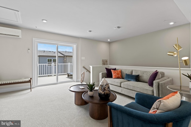 living room featuring an AC wall unit and carpet