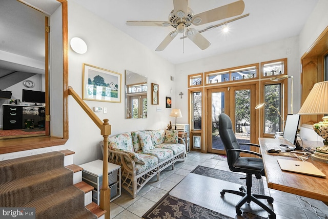 office featuring light tile patterned floors and ceiling fan