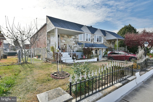 view of front of house featuring a porch and a front yard