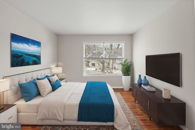 bedroom with wood finished floors