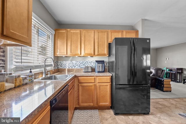 kitchen with sink and black appliances