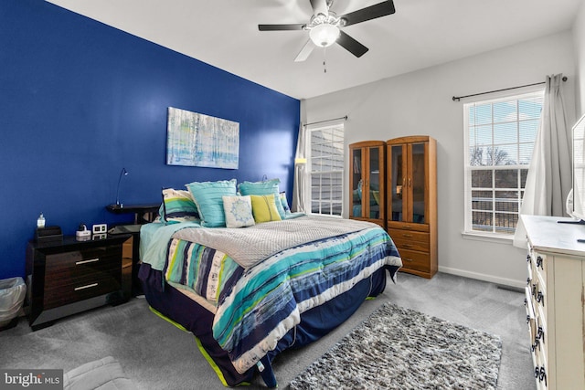 carpeted bedroom featuring ceiling fan